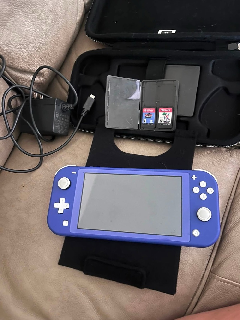 Nintendo Switch Lite Handheld Console - Blue with games and carry case